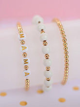 Load image into Gallery viewer, Cream and Gold MAMA word beaded bracelet set
