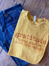 Load image into Gallery viewer, Gratitude turns what we have into enough t shirt
