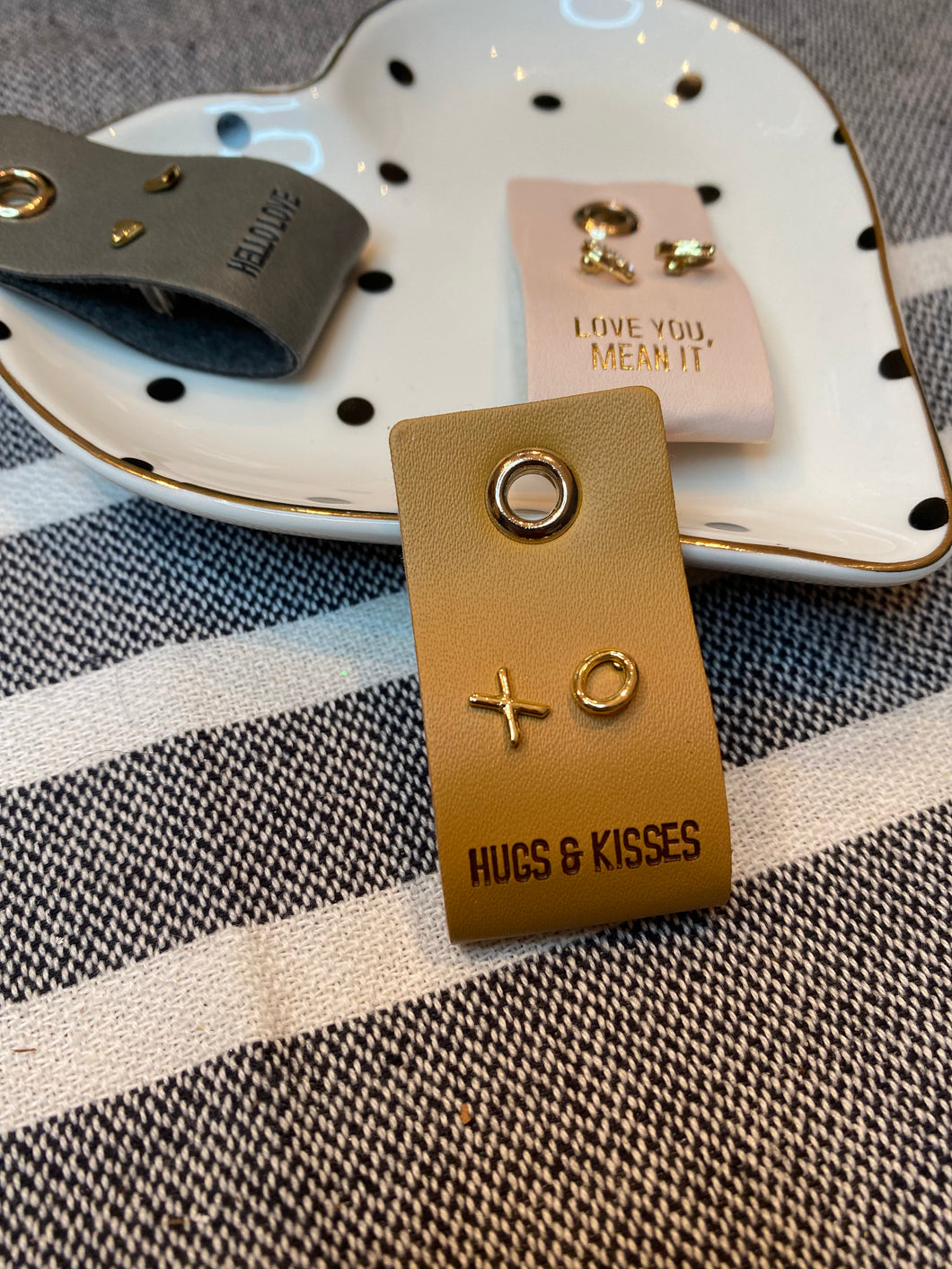 X’s and O’s leather tag earrings